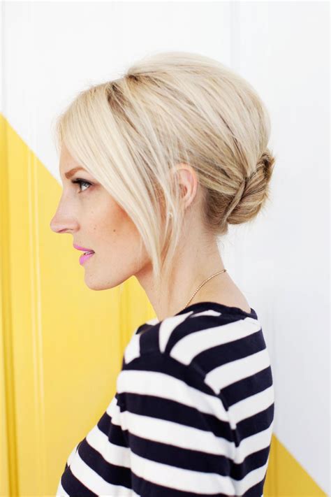 Wavy and lovely, this short hair bun receives a boost from some properly used styling product and a teased under layer. Simple Chignon Updo - A Beautiful Mess