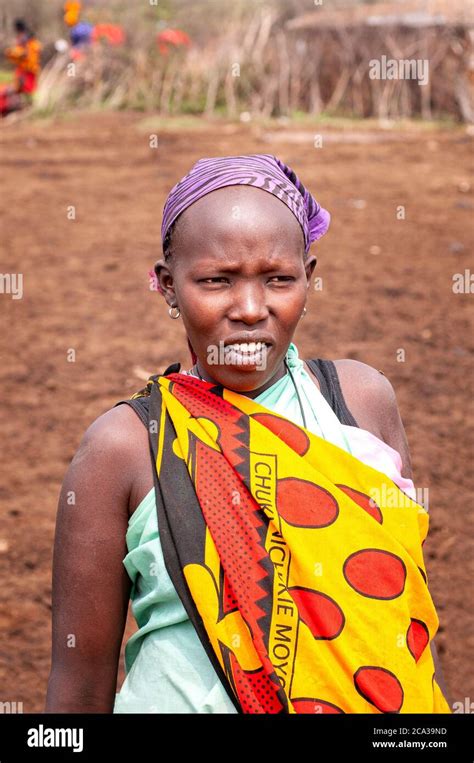 Maasai Woman Wearing Traditional Attire In A Maasai Village Maasai