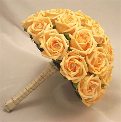 From garters to ring bearer pillows, browse these popular gold wedding. Bridal Bouquets - Gold Open Rose Diamante Bridal Posy ...