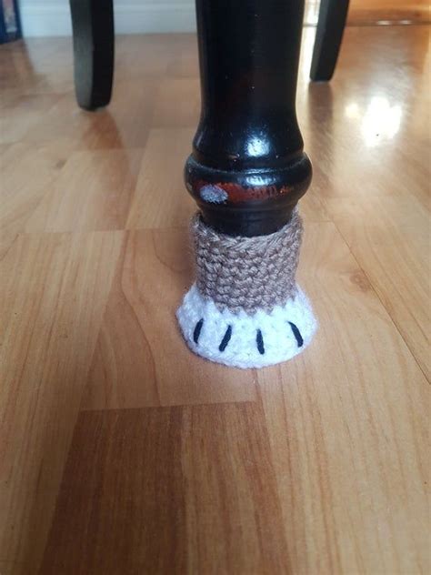 These cat paw socks are a fun and creative way to protect your wooden and hard surface floors from scratches made by furniture being moved on it. Crochet paw chair socks, Cat paw chair feet, paw chair ...