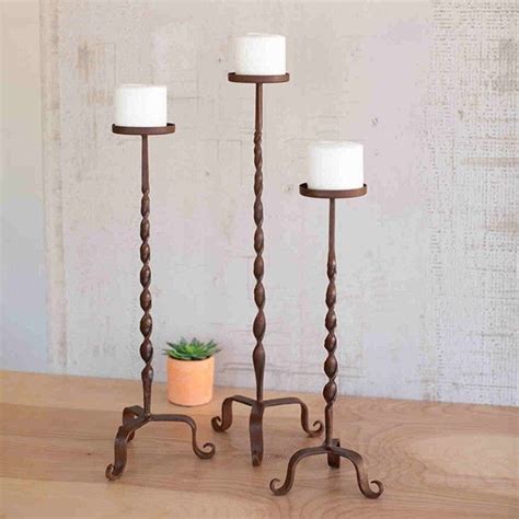 It is called mist and comes with a timeless, round shape in a heavy. Tall Iron Candle Stands, Set of 3 | Floor candle holders ...