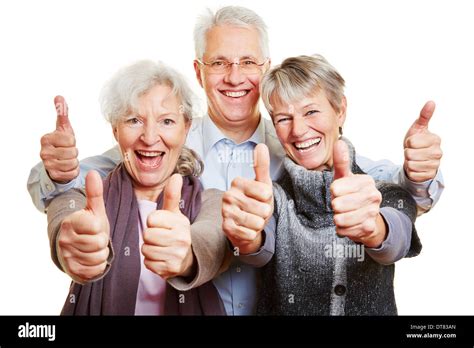 Three Happy Senior People Holding Their Thumbs Up Stock Photo 66561117