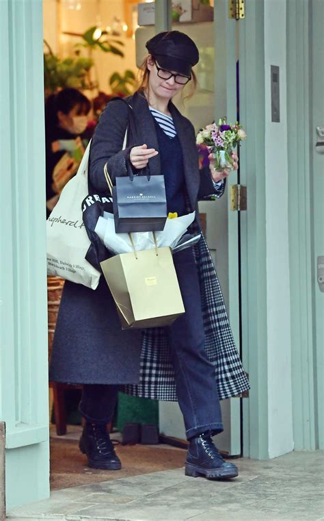 James portrays an archeological student named peggy preston. Lily James in a Black Floral Dress Picks up Some Groceries ...