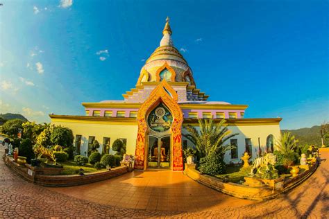 White Buddhist Temple With Blue Cloudy Background · Free Stock Photo