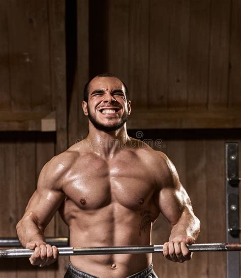 Strong Weightlifter Exercising Stock Photo Image Of Healthy Person