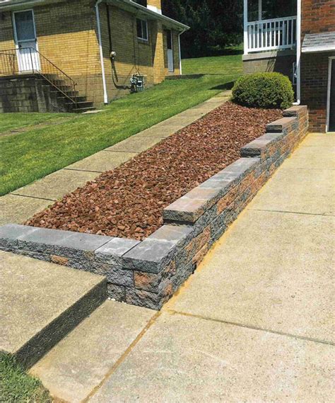 Retaining Wall and Concrete Driveway - D-Bug Waterproofing