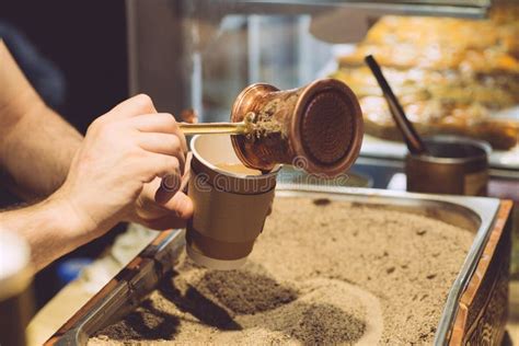 Brewing Turkish Coffee On Hot Sand The Traditional Method Of Making