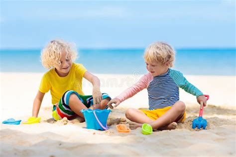 Kids Playing On Beach Children Play At Sea Stock Photo Image Of