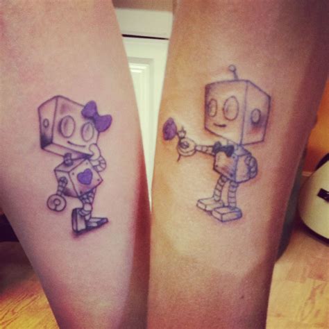 Actually, there are lots of couples who do matching tattoos nowasays! Couple matching robot tattoo | tattoos | Pinterest