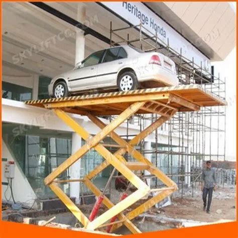 2 post mild steel hydraulic car lift for parking 2 4 tons at rs 225000 in ahmedabad