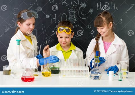 Three Little Students On Chemistry Lesson In Lab Stock Photo Image Of