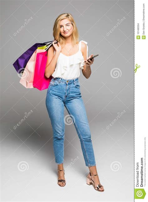 Beautiful Blonde Woman With Phone Shopping Concept Isolated On White