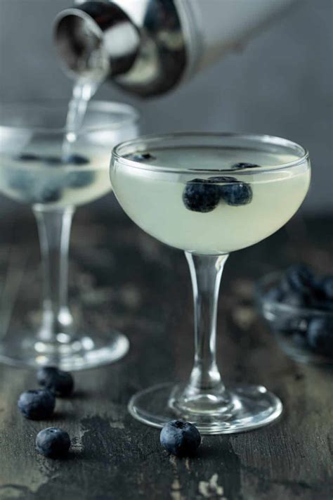 Easy Blueberry Martini With Elderflower Liqueur Garnish With Lemon