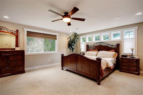 A ceiling fan is a simple and energy efficient way to keep your bedroom cool and comfortable when you need it most. Traditional Master Bedroom with Ceiling fan, Hunter Fans ...