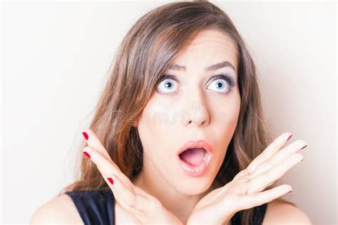 Surprised And Shocked Beautiful Woman Looking Up Stock Photo Image Of