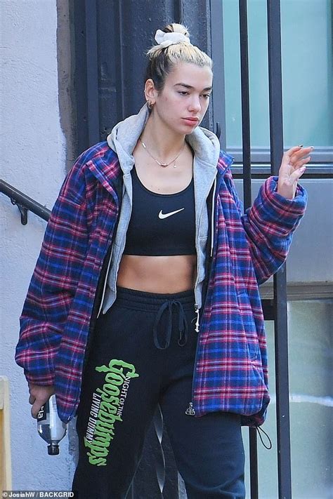 Dua Lipa Flaunts Her Abs In Sports Bra And Quirky Tracksuit Bottoms In New York Daily Mail Online