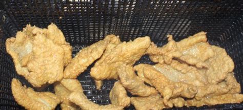 Brush both sides of fillets with dressing. Fried Catfish | RealCajunRecipes.com: la cuisine de maw maw