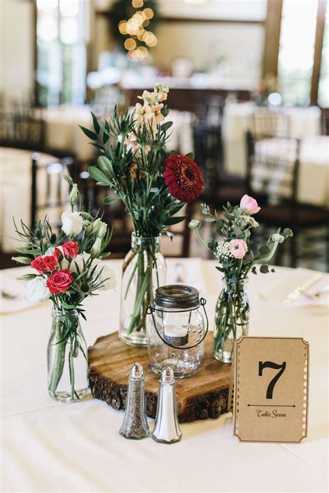 We love rustic centerpieces at Carl House! | Burgundy wedding centerpieces, Wedding centerpieces ...
