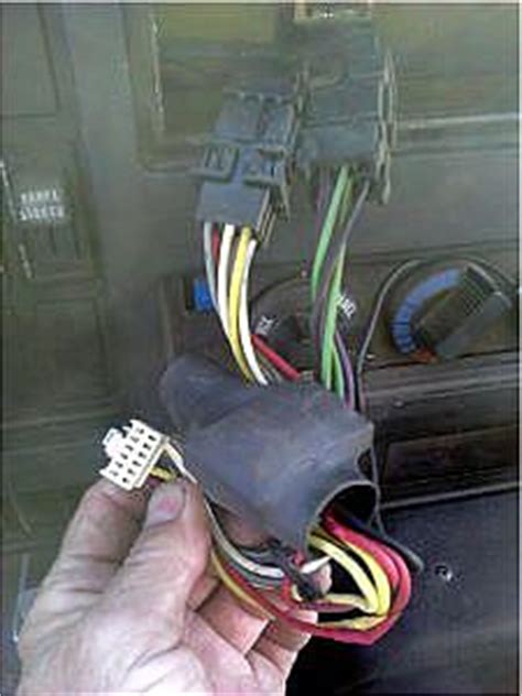 It doesn't specify pin outs but it does show the wiring harnesses. International truck radio