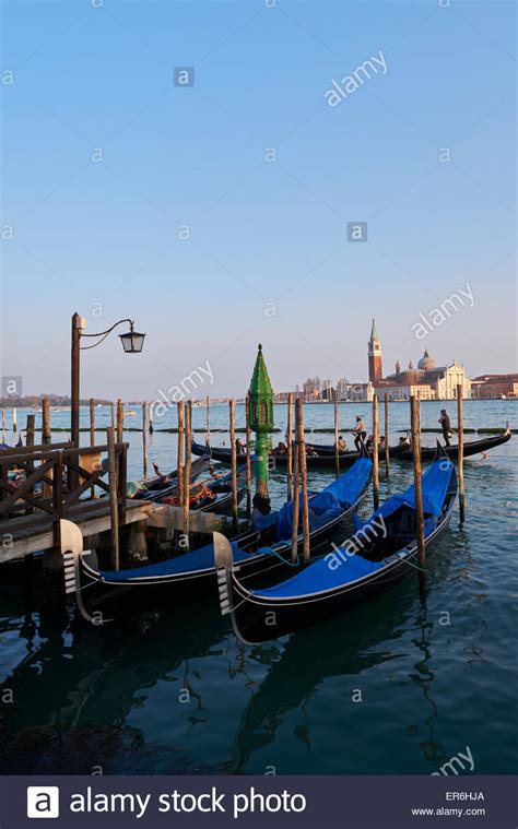 Gondolas And View Looking Out At The Cathedral Of San Giorgio Maggiore
