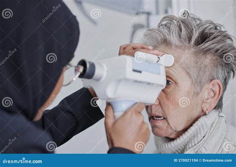 Optometrist Eye Test And Senior Woman Patient In Healthcare Checkup