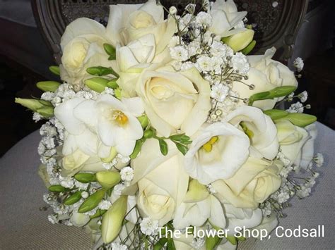 Bridal Bouquet Of Ivory Roses Ivory Freesia White Lizzianthus And