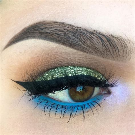 Aquatic pet store in budapest, hungary. summer eye makeup @kaitlyn_nguy: olive green glitter ...