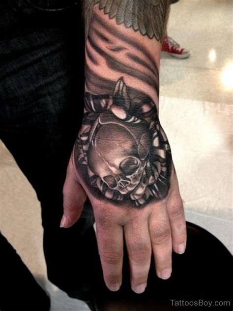 Awesome Skull Tattoo On Hand Tattoo Designs Tattoo Pictures