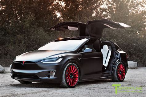 You really can't go wrong with either choice. Satin Black Tesla Model X - White Interior