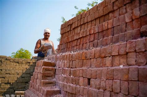 Premium Photo Indian Labor Working At Brick Factory