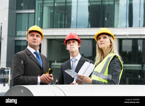 Construction managers inspecting a construction site Stock Photo - Alamy