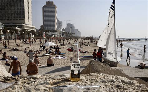Officials Fume As Israelis Ignore Rules Crowding Beaches Stores And