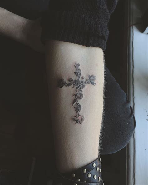 Cross Made Out Of Flowers Tattoo