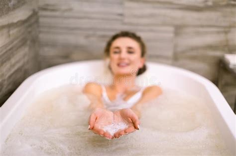 Attractive Woman Taking Hydro Massage Bath With Foam Beautiful Smiling Young Woman Showing Foam