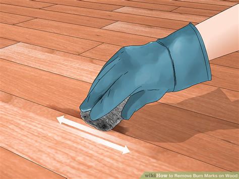 You can remove burn stains from wooden tables and similar, by first cleaning it, and then make a mix of 1 tablespoon of toothpaste and 2 tablespoons of baking soda. 3 Simple Ways to Remove Burn Marks on Wood - wikiHow