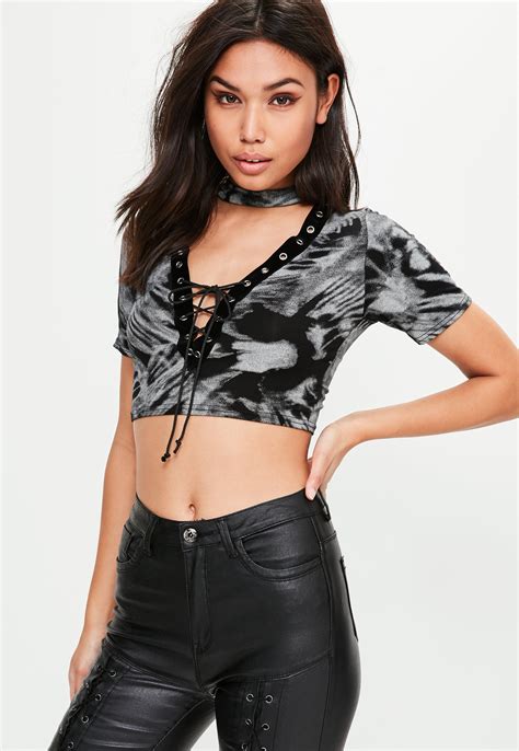 lyst missguided black washed out lace up crop top in black