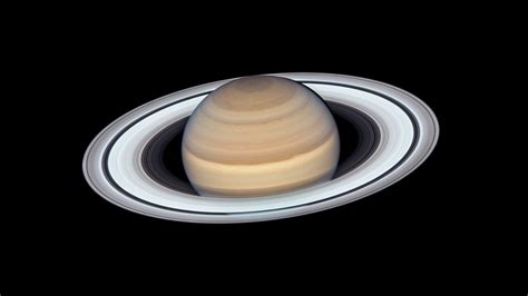 Hubble Captures Five Of Saturns Moons In A Single Stunning Photograph