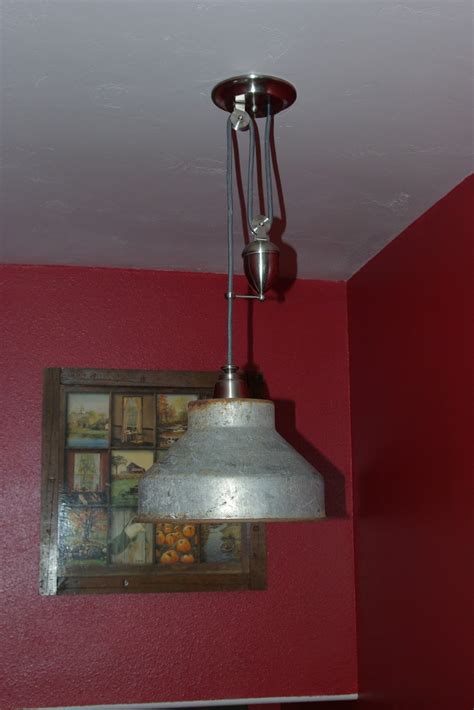 These fixtures are simple to install. Reclaimed Rustics: Pulley Light Fixture