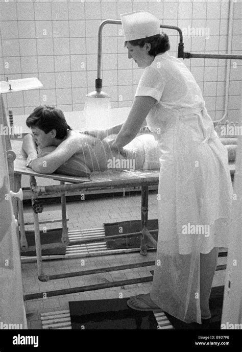 A Nurse At Rodnik Sanatorium Operates A Sulphuric Massage Shower Stock