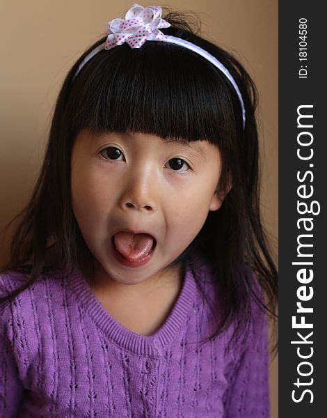 Asian Girl With Tongue Out Free Stock Images And Photos 18104580