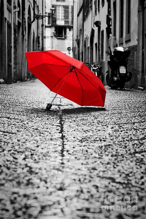 Red Umbrella On Cobblestone Street In The Old Town Photograph By Michal
