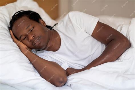 Premium Photo Portrait Of Calm Young Black Man Sleeping In