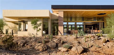 Desert modern rooms always need at least one piece of rustic wood furniture. Desert Architecture