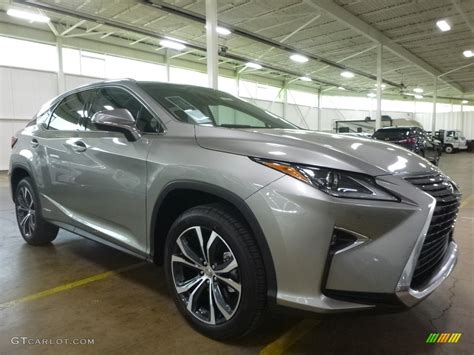 Atomic silver is definitely more complex than the generic grey of nebula grey. 2017 Atomic Silver Lexus RX 450h AWD #120488179 Photo #4 | GTCarLot.com - Car Color Galleries