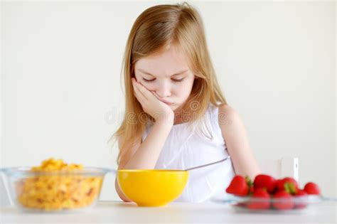 Little Girl Eating Cereal With Milk Stock Image Image Of Home