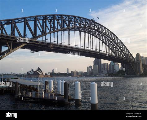 Sydney Harbour Bridge And The Cityscape Below Seen From Milsons Point