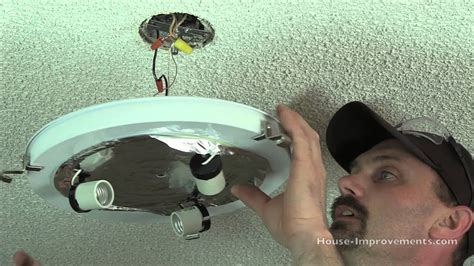 Hang the fixture thread the fixture's mounting stem into the mounting strap on the ceiling box. How To Replace A Ceiling Light Fixture - YouTube