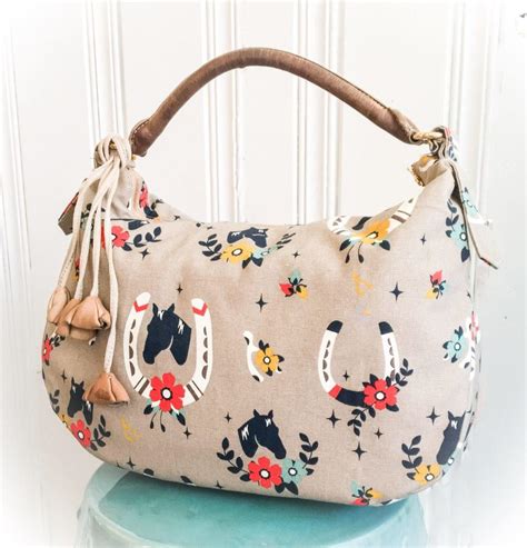 Fun and free yarn patterns are easy to find online and are perfect for anyone who loves crafting. The Lauren Bag Pattern | AllFreeSewing.com