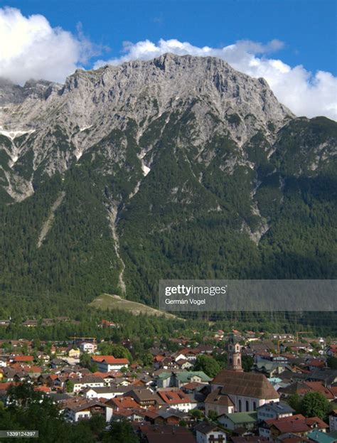 Majestic Alps Mountain Peaks And Forests By Alpine Town Of Mittenwald