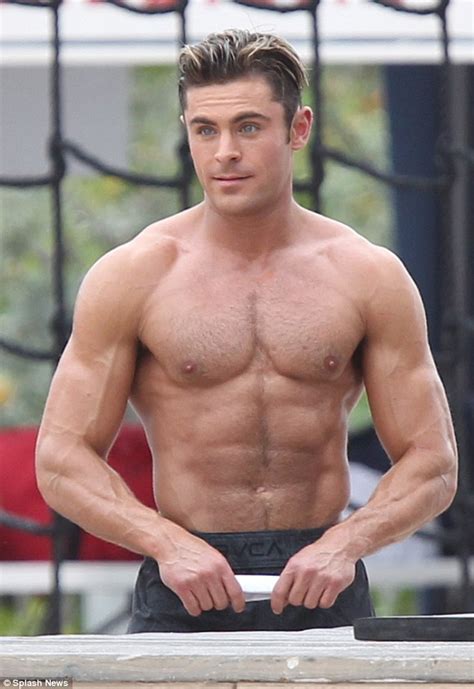 Zac Efron Flexes His Incredible Muscles As He Goes Shirtless On Baywatch Set Daily Mail Online